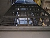 Шахтный подъемник с несущей металлокаркасной шахтой. Проходная кабина. Г/П - 2000кг